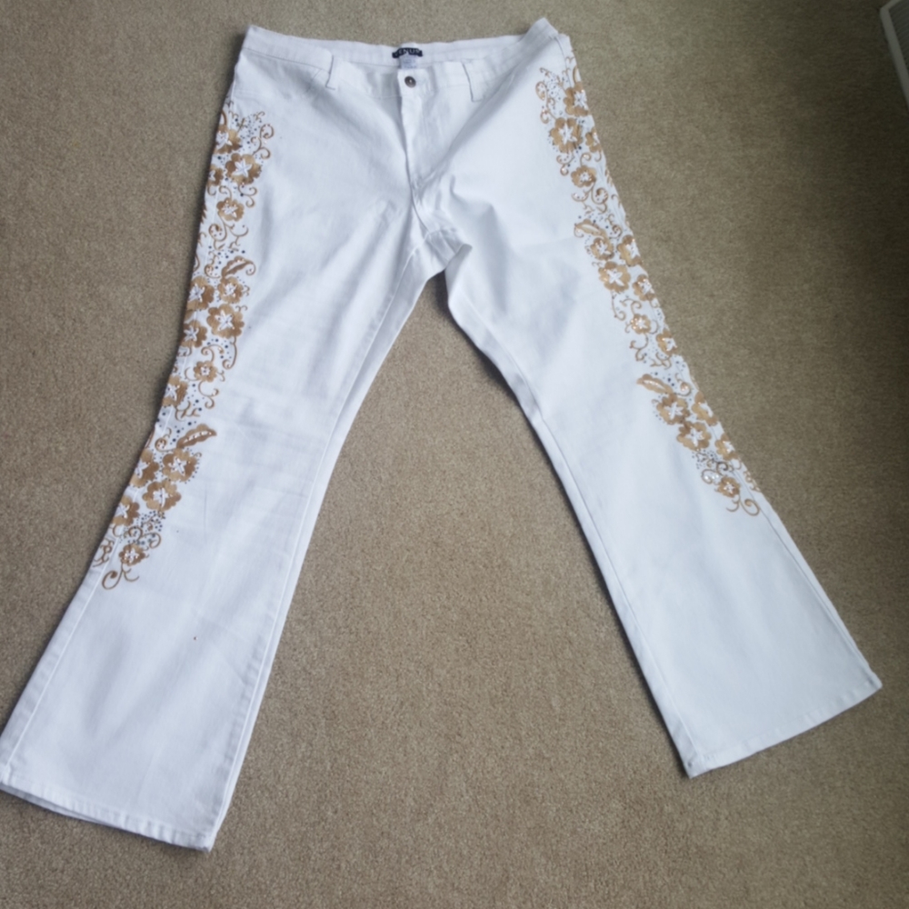 white jeans embellished with gold